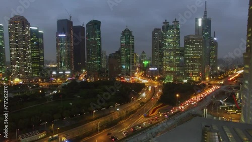 Wallpaper Mural Transport traffic on highway among skyscrapers at evening. Torontodigital.ca