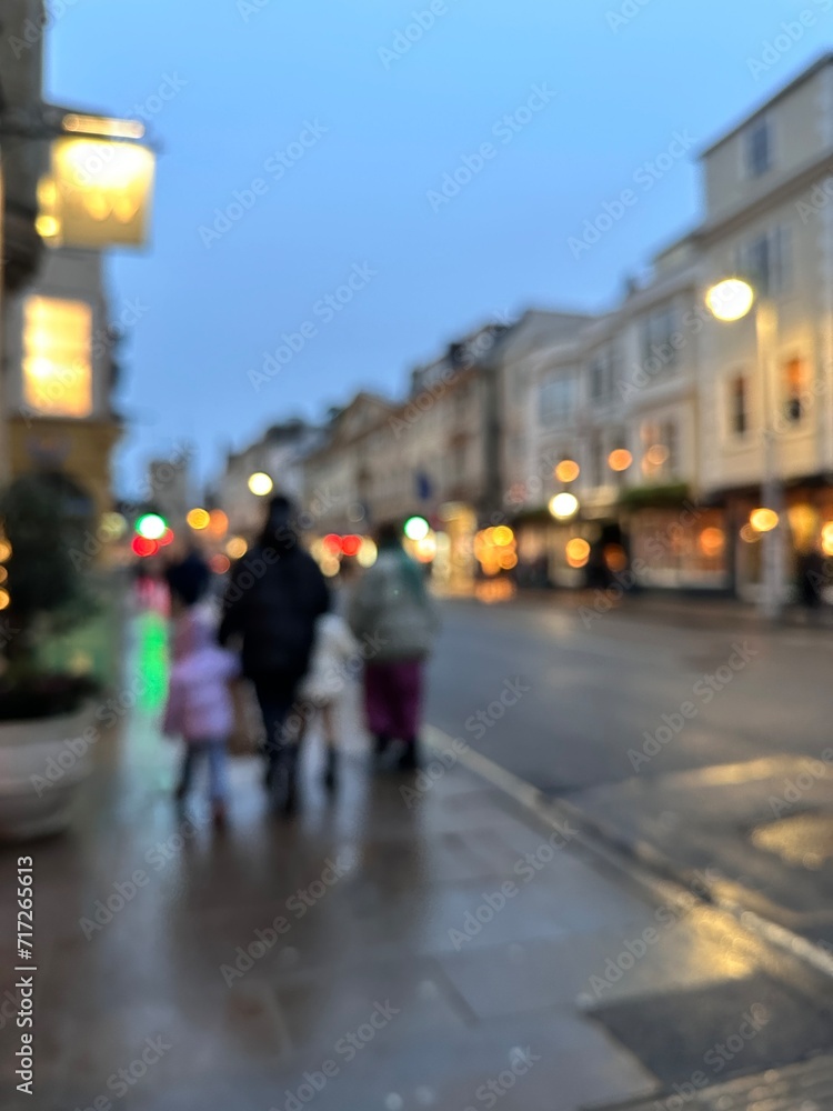 Blurred shot of a city street in the evening on a rainy day
