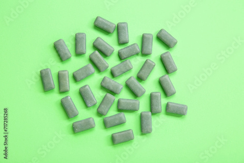 Chewing gums on green background