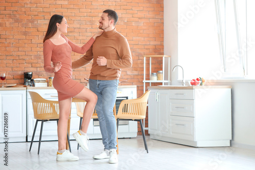 Happy young couple dancing ...