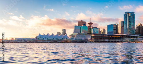 Canada Place and city building skyline at cloudy sunrise. Downtown Vancouver