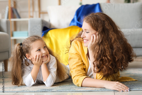 Happy little girl and her m...