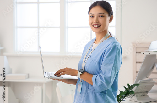 Female Asian medical intern...