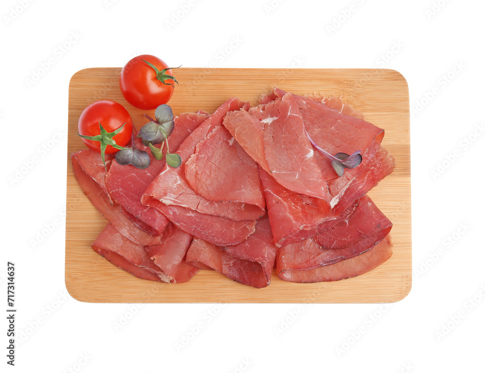 Slices of tasty bresaola and tomatoes isolated on white, top view Slices of tasty bresaola and tomatoes isolated on white, top view