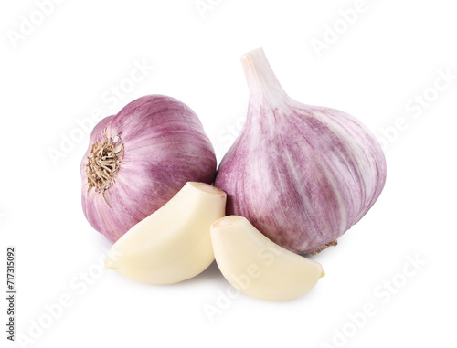 Heads of fresh garlic and cloves isolated on white