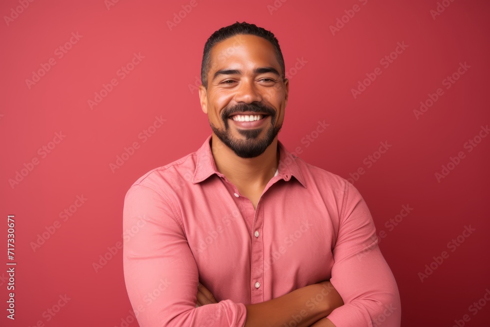 Portrait of a happy smiling african american man over red background Portrait of a happy smiling african american man over red background