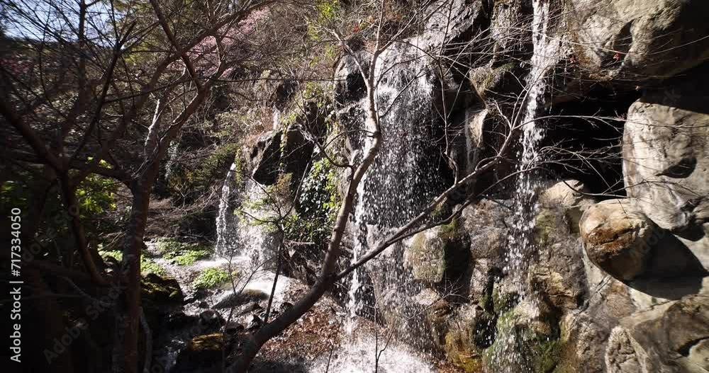 Waterfall at Atami plum park in Shizuoka daytime tilt up Waterfall at Atami plum park in Shizuoka daytime tilt up