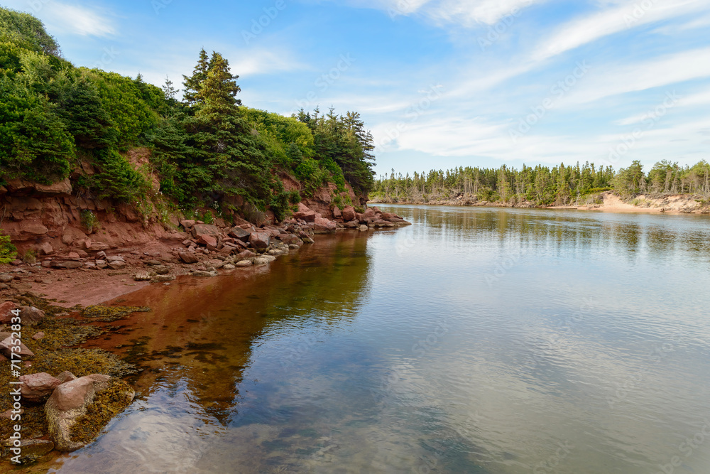 Basin Head PEI river with cloudy blue sky Basin Head PEI river with cloudy blue sky