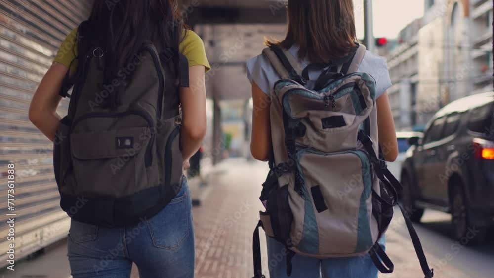 Asian beautiful women backpacker friend traveling outdoor in the city. Asian beautiful women backpacker friend traveling outdoor in the city.