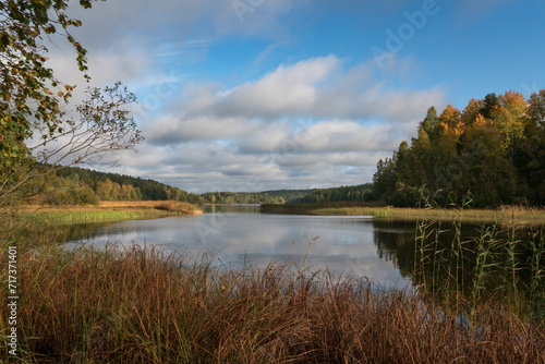 Fotografie View from the shore of Lake Ladoga near the village of Lumivaara on a sunny autu