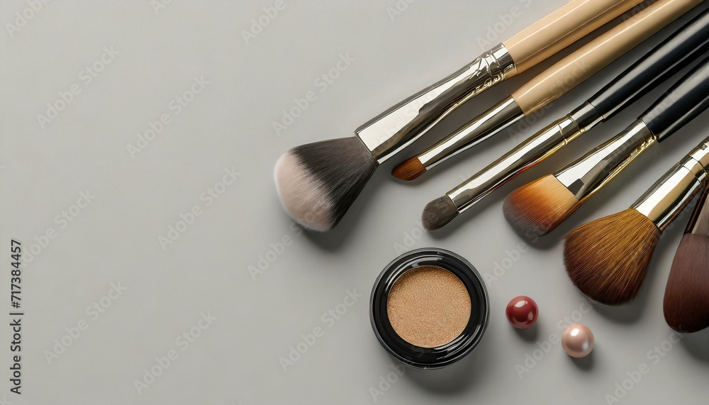 makeup brushes and powder on table makeup brushes and powder on table
