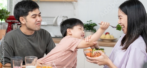 family time, breakfast, activities together during the holidays. Parents and children are having a meal together during the holidays. New home for family on morning, enjoy, weekend, vacant time