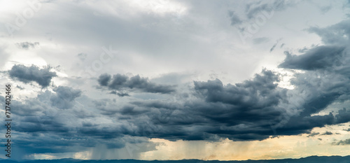 Fototapeta Naklejka Na Ścianę i Meble -  Storm clouds with the rain. Nature Environment Dark huge cloud sky black stormy cloud