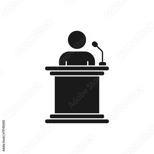 Man speech on podium. Male speaker icon flat style isolated on white background. Vector illustration