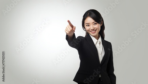 Business woman pointing finger 