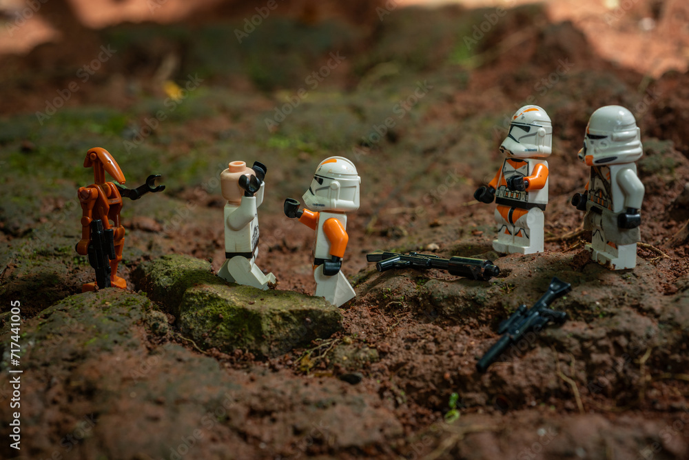 Obraz premium Depok, Indonesia - January 24, 2024: Lego toys photography, 212th clone troopers on battle over red soil during clone wars, bokeh background