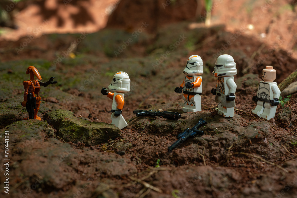 Naklejka premium Depok, Indonesia - January 24, 2024: Lego toys photography, 212th clone troopers on battle over red soil during clone wars, bokeh background