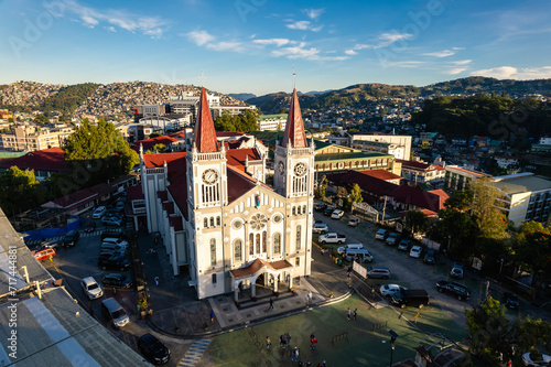 Baguio City, Philippines - Aerial of Our Lady of the Atonement Cathedral or Baguio Cathedral and the surrounding cityscape.