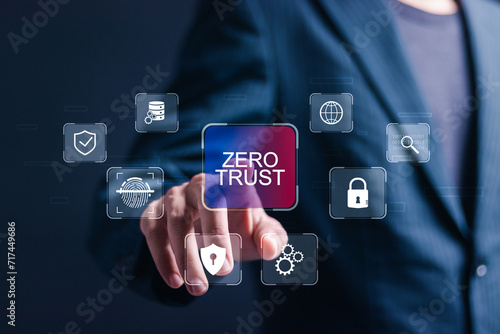 Zero trust security concept, Businessman touching virtual zero trust icon for business information security network. photo