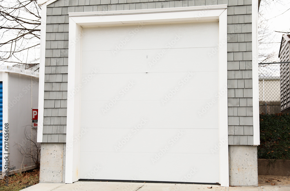 Fototapeta premium suburban life with a cozy garage house, symbolizing warmth, family, and the comfort of home