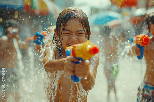 Happy summer days by the pool with the family. Songkran Day, a time of pure happiness and fun.