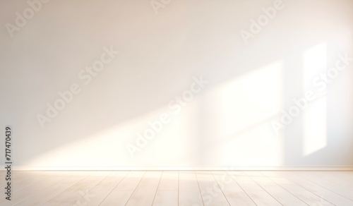 Sunlight on a white wall for product presentation and emphasizing a clean and well lit setting suitable for showcasing products. © PJang