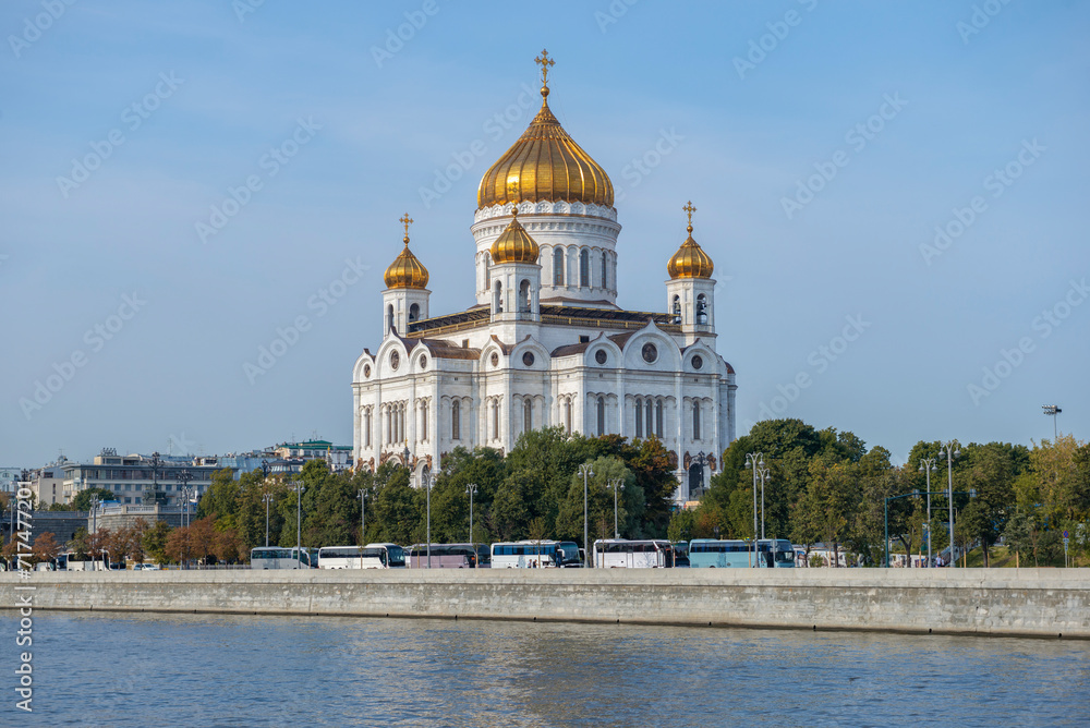 Cathedral of Christ the Savior on the Moscow River embankment on a sunny September day. Moscow, Russia