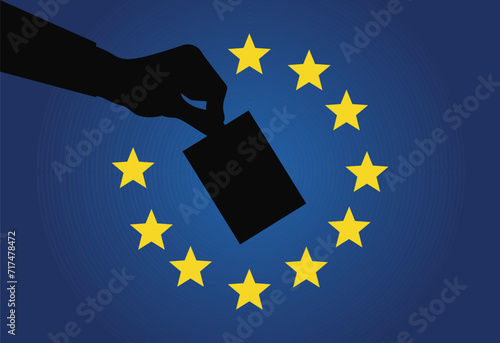 European vote vector: Silhouette of an arm holding a ballot voting paper centered within the EU flag's circle of 12 gold stars, symbolizing active participation in EU elections. photo