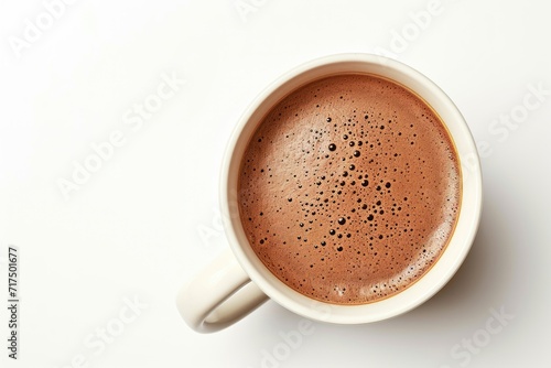 Top view of white mug with cocoa drink on white background