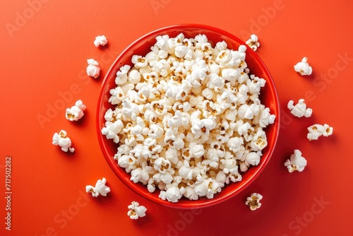 Red bowl with popcorn from top perspective