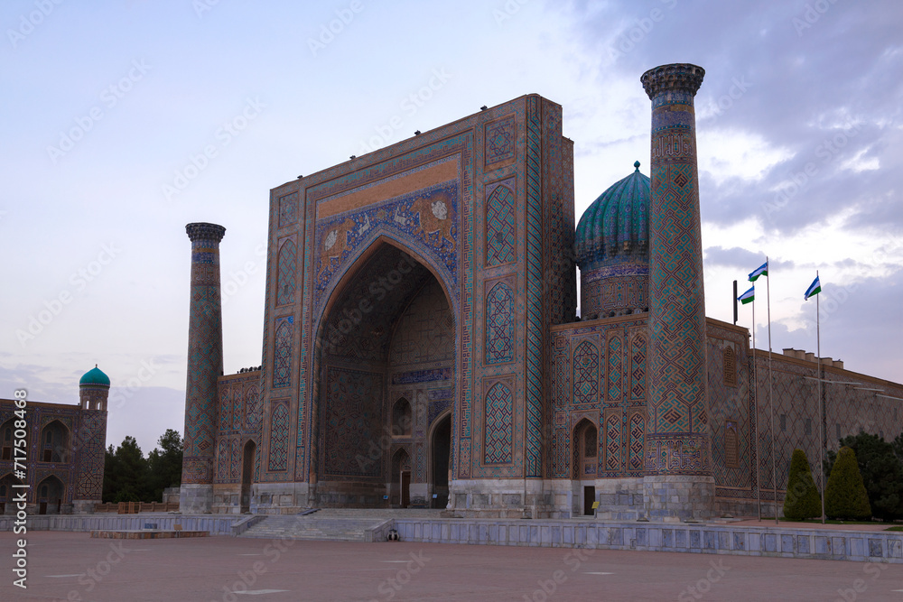 Sherdor Madrasah on the Registan square in early September morning, Samarkand. Uzbekistan