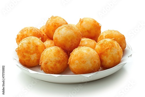 Cheese ball or cheesy puffs on white plate isolated on white with clipping path