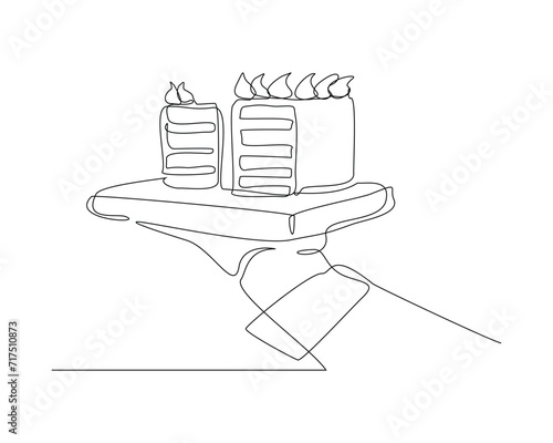 Continuous single line sketch drawing of waitress hand holding tray with birthday tart cake. One line art of delicious dessert bread cake surprise decoration hand serving vector illustration