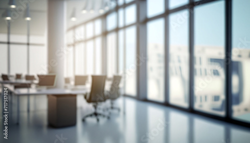 Beautiful blurred background of a light modern office interior with panoramic windows and beautiful