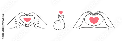 Korean finger heart gesture set. Doodle vector illustration. Collection of hand signs showing and giving love. Support, hope, charity symbol. Hand drawn line art. Vector illustration.