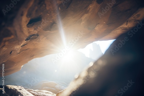 natural light beam entering through a cave roof hole
