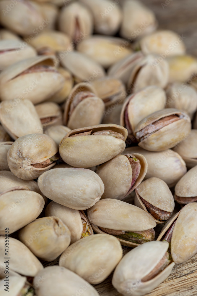 Salted fried pistachios on the table Salted fried pistachios on the table