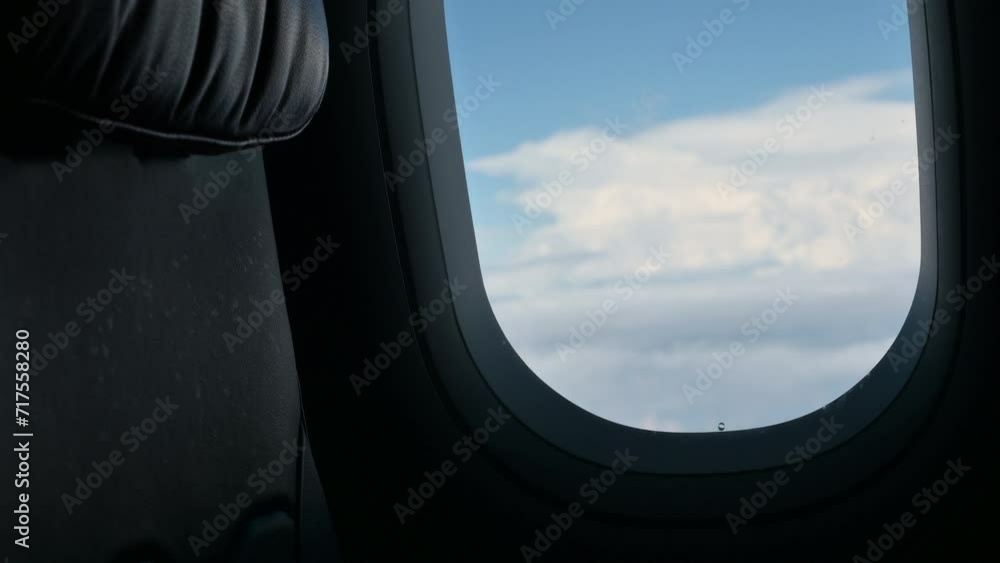 airplane flight flying trip travel above clear blue sky with beautiful cloud, looking at view through window of plane airplane flight flying trip travel above clear blue sky with beautiful cloud, looking at view through window of plane