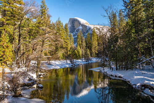 View of the Half Dome and the Merced River from the Sentinel Bridge in Yosemite National Park photo