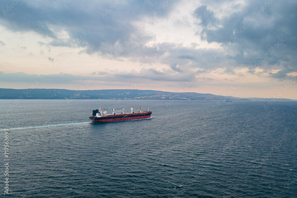 Aerial view of Large Bulk carrier ship transport unpackaged bulk cargo underway through Dardanelles Strait Aerial view of Large Bulk carrier ship transport unpackaged bulk cargo underway through Dardanelles Strait