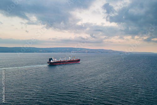 Aerial view of Large Bulk carrier ship transport unpackaged bulk cargo underway through Dardanelles Strait