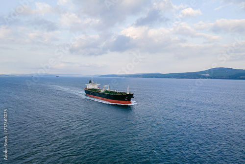 Aerial view of Oil tanker ship underway ship transport underway through Dardanelles Strait in Turkey. Worldwide logistic of oil and global trade