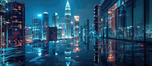 Night view of Kuala Lumpur city with empty floor. Copy space image. Place for adding text or design