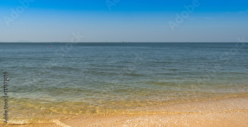 Fototapeta Naklejka Na Ścianę i Meble -  Beach on the Baltic Sea in Poland. Panoramic view. sty minamal, beachscape and tropical sky