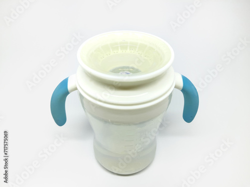 360 Degree Silicone Baby Training Cup Bottle on isolated background