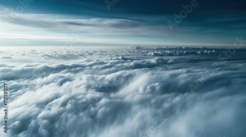 The sea of clouds from above and behind contained black smoke produced by volcanoes. photo
