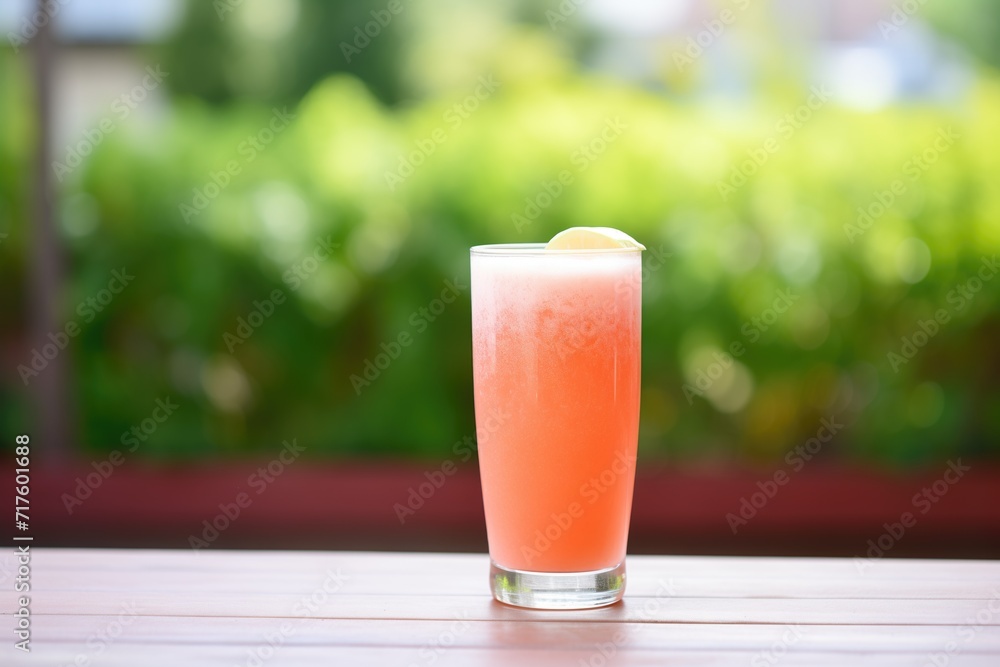 a glass frosted with cold watermelon juice on a hot day a glass frosted with cold watermelon juice on a hot day