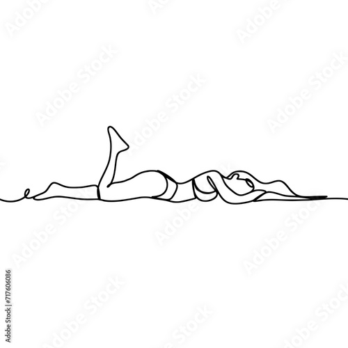 Girl wearing a bikini lying down