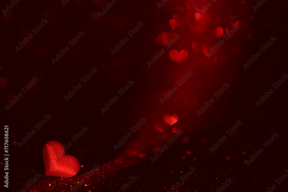 Red heart on red background with highlights. Beautiful holiday background, background for postcards Red heart on red background with highlights. Beautiful holiday background, background for postcards