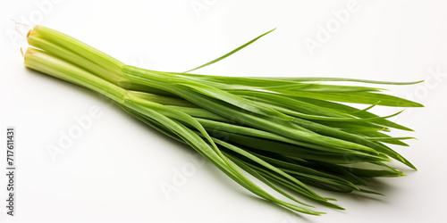 Lemongrass exudes freshness against a simple white backdrop, its aromatic essence ready to elevate culinary experiences